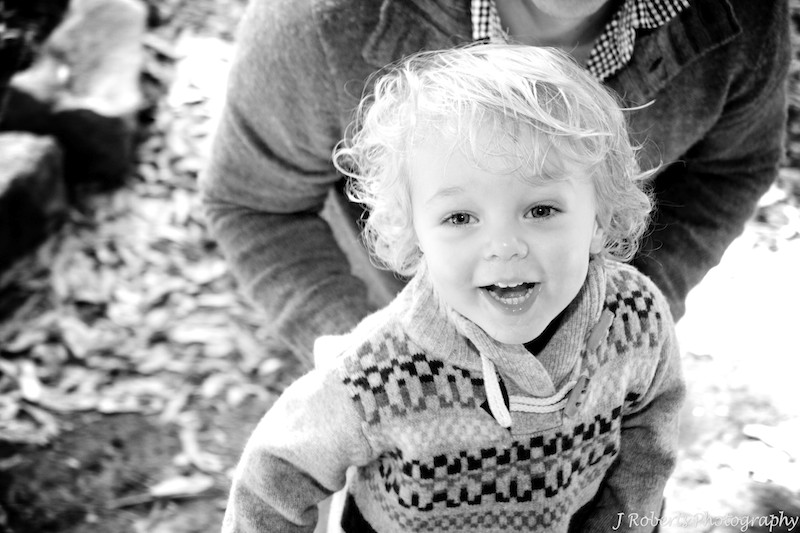B&W of little boy laughing - family portrait photography sydney